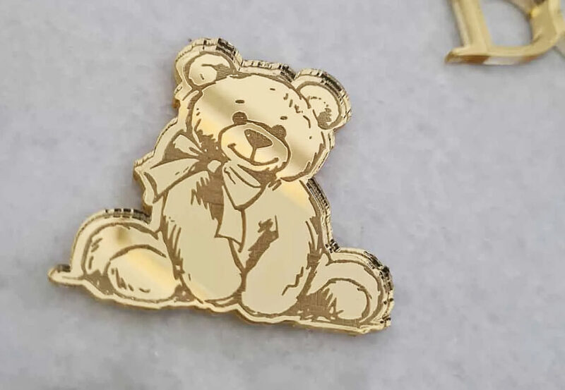 gold teddy tag